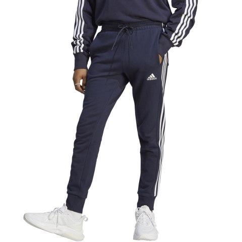 Spodnie męskie adidas Essentials French Terry Tapered Cuff 3-Stripes granatowe IC9406 Adidas